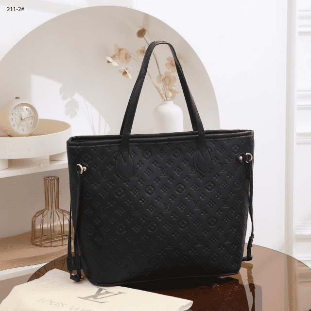 Tas Louis Vuitton 211-2 Monogram Empreinte Leather Neverfull Bag